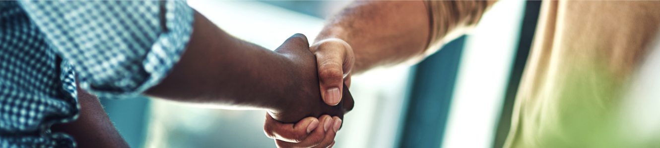 Two men shaking hands.